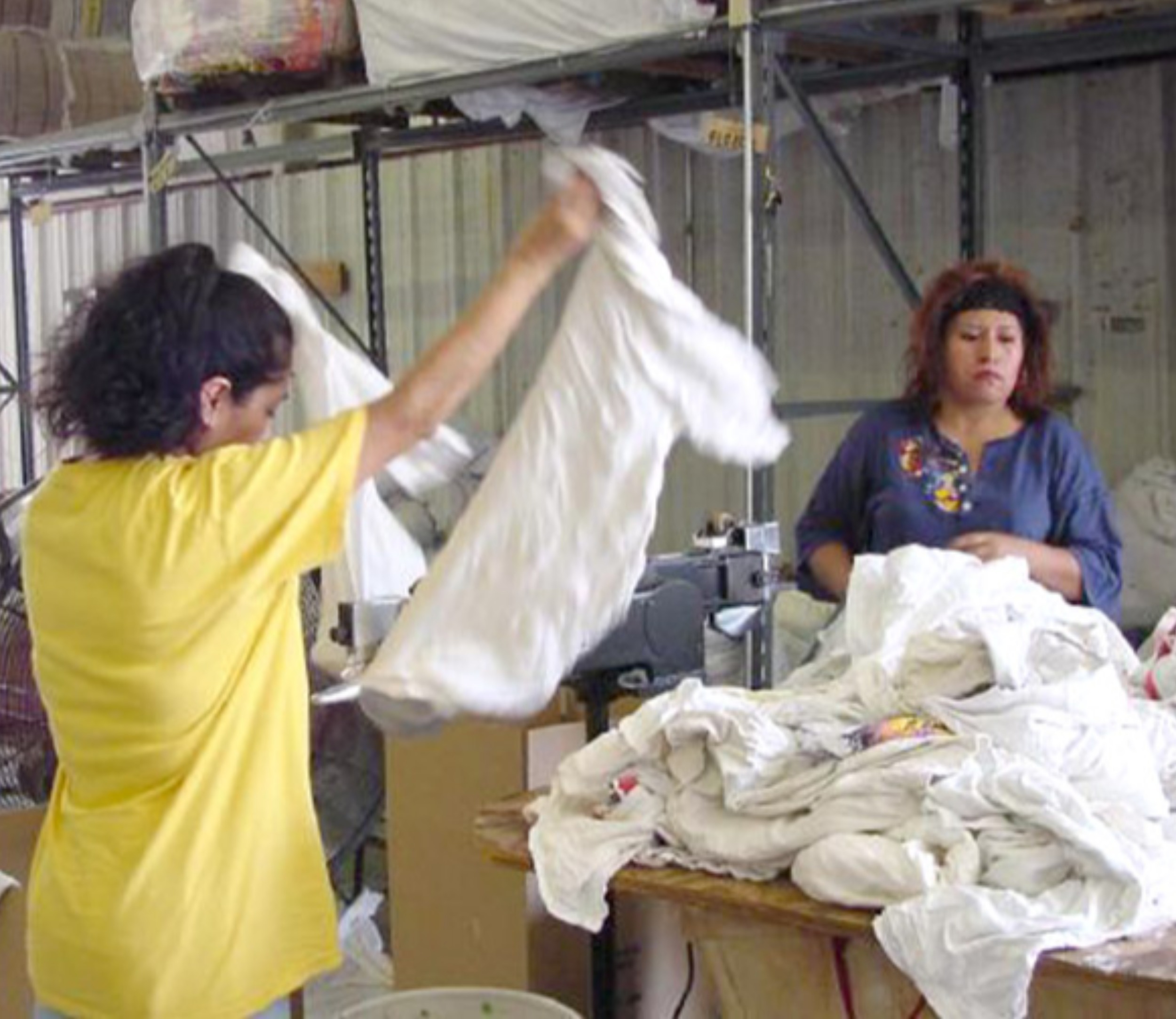 Soliciting woman to use a cutting machine to cut used clothes and make rags