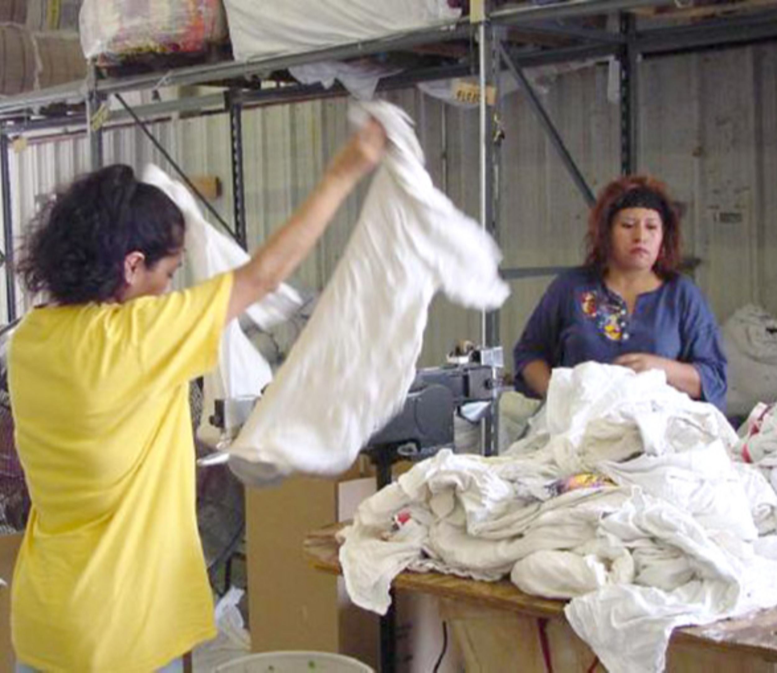 Soliciting woman to use a cutting machine to cut used clothes and make rags